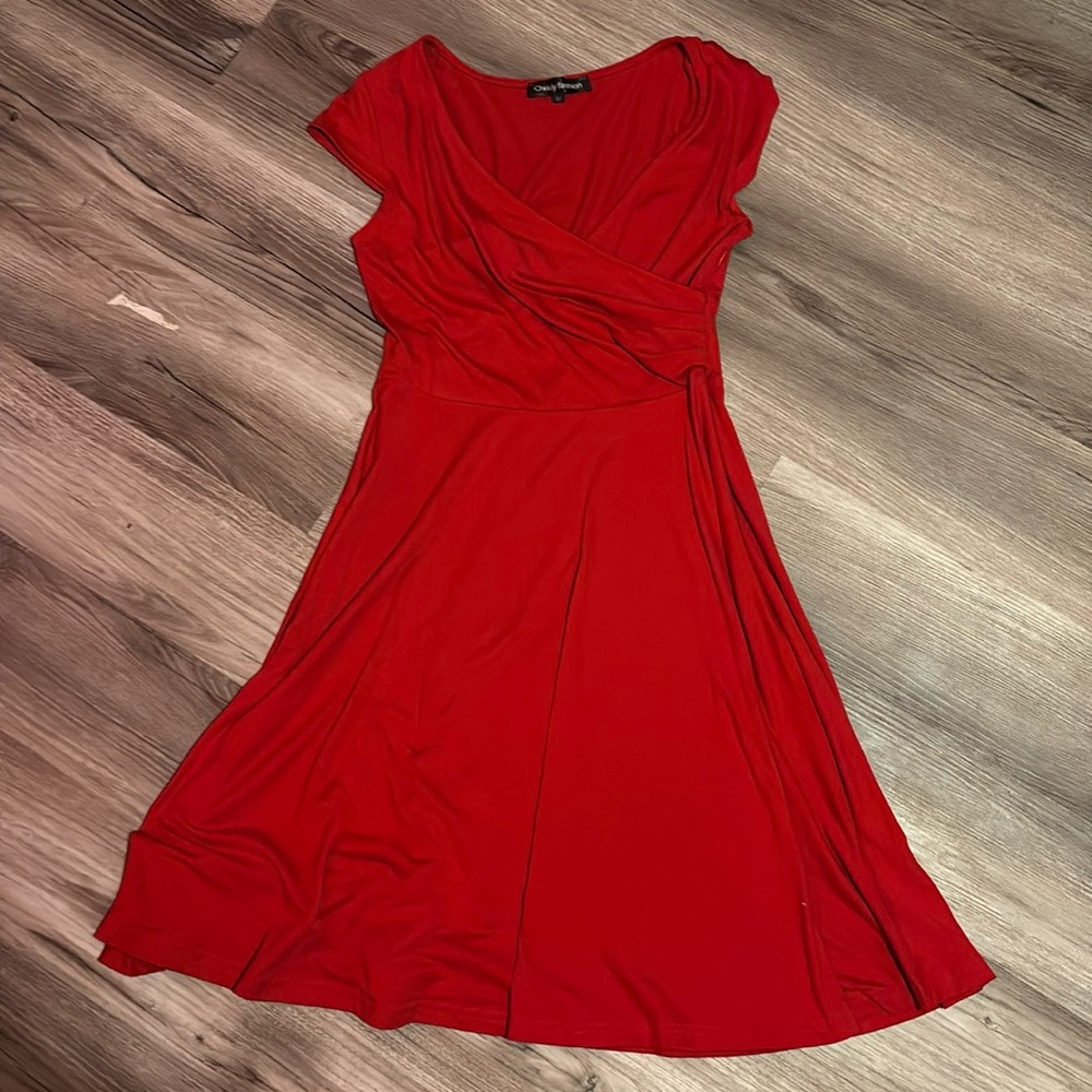 It’s a mid length red dress